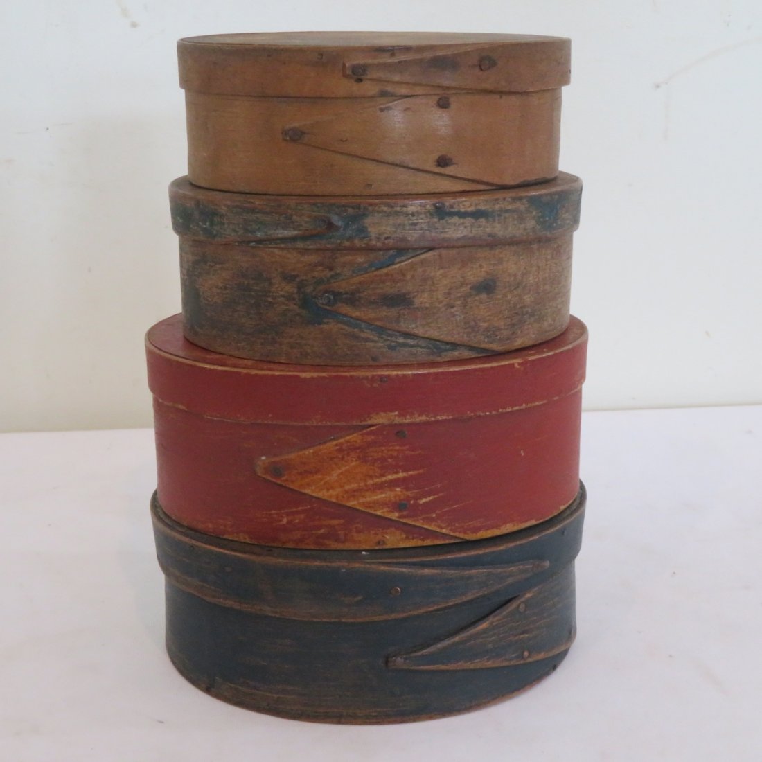 4 oval Harvard lap pantry boxes: 4 oval Harvard lap pantry boxes from 5.25" long to 6.25", 3 are painted and one is natural, small box has a cut in the top to make it into a bank.