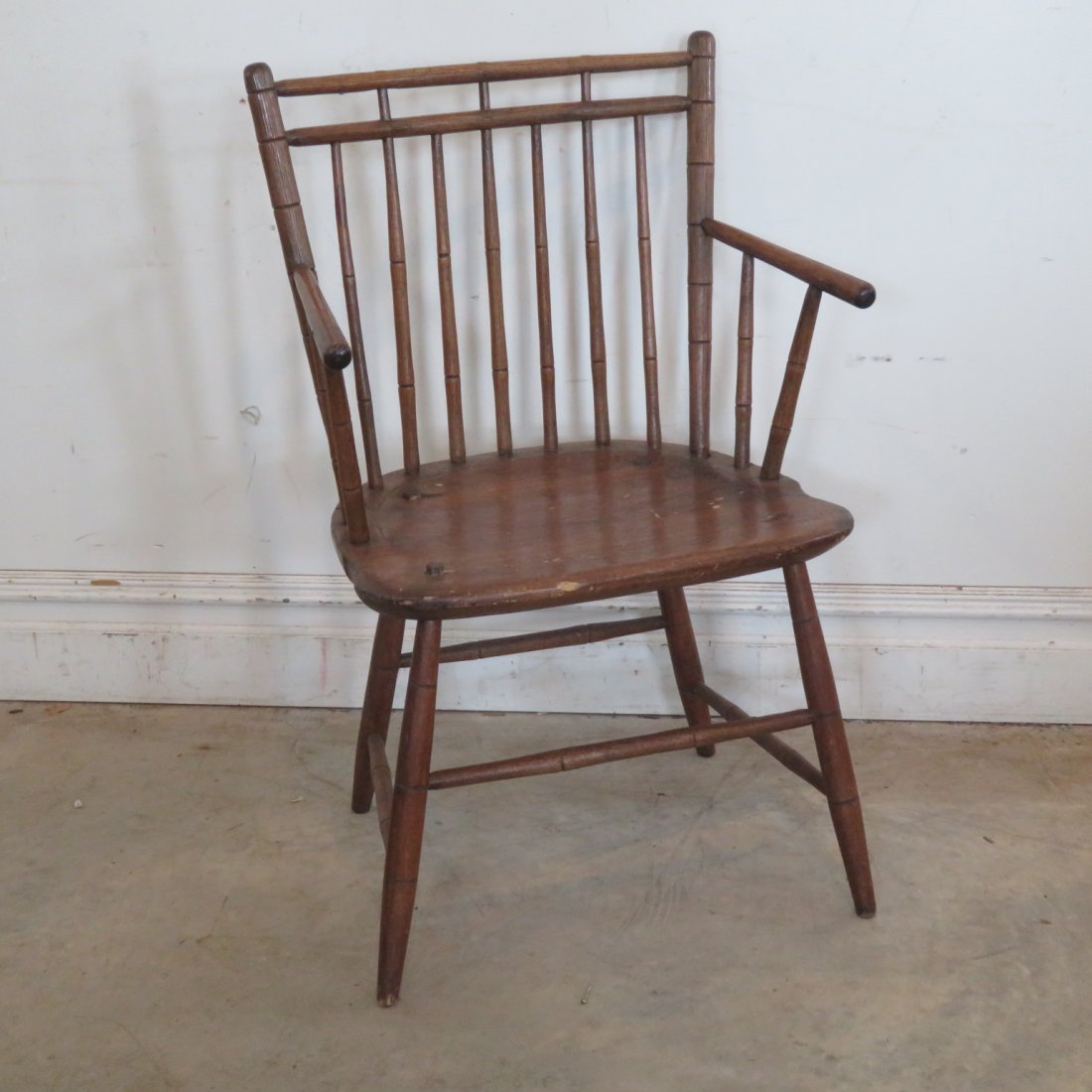 Rod back Windsor arm chair: Period rod back Windsor arm chair, single board seat, all mortise & tenon construction, 17" seat height, old natural finish, 34" x 20.5" x 17"