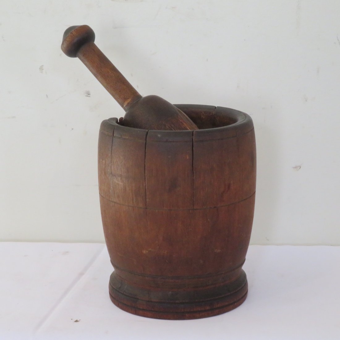 Wood mortar and pestle: Wood mortar and pestle in old dark natural patina, mortar 7" t. x 6" dia., pestle 9" long