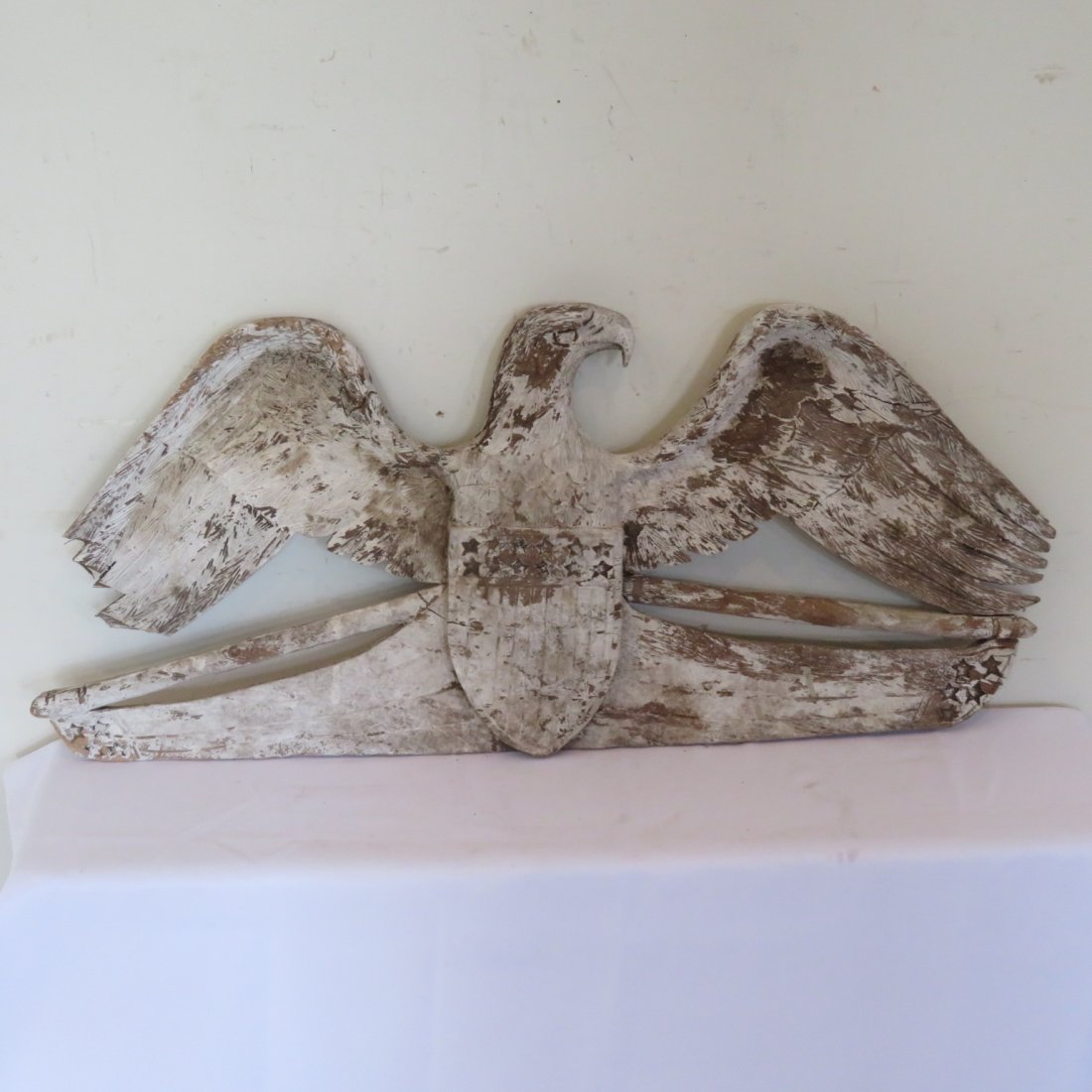 Carved wooden eagle & shield in old white paint (1 of 10)