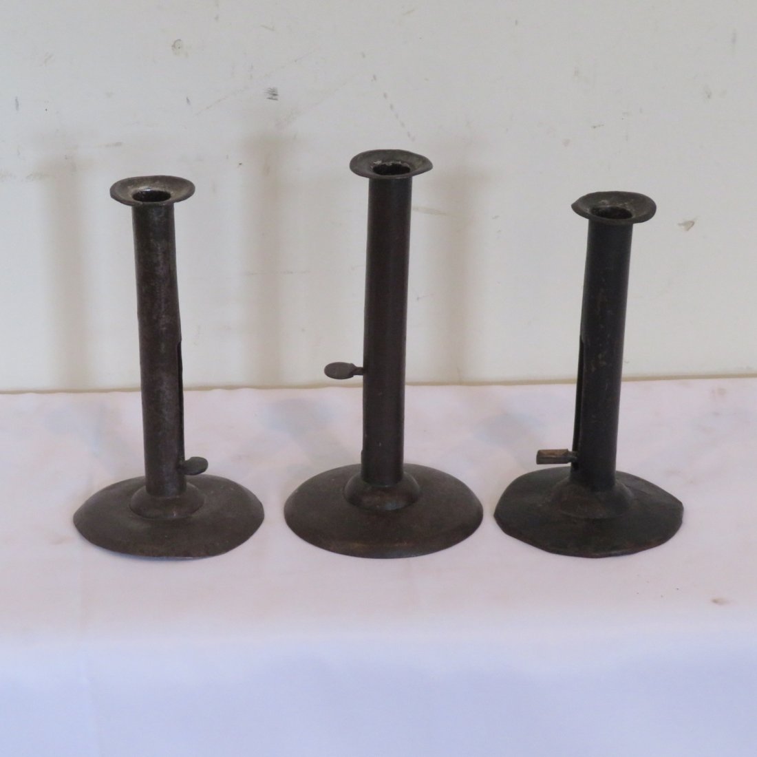 3 early hogscraper candlesticks (1 of 3)