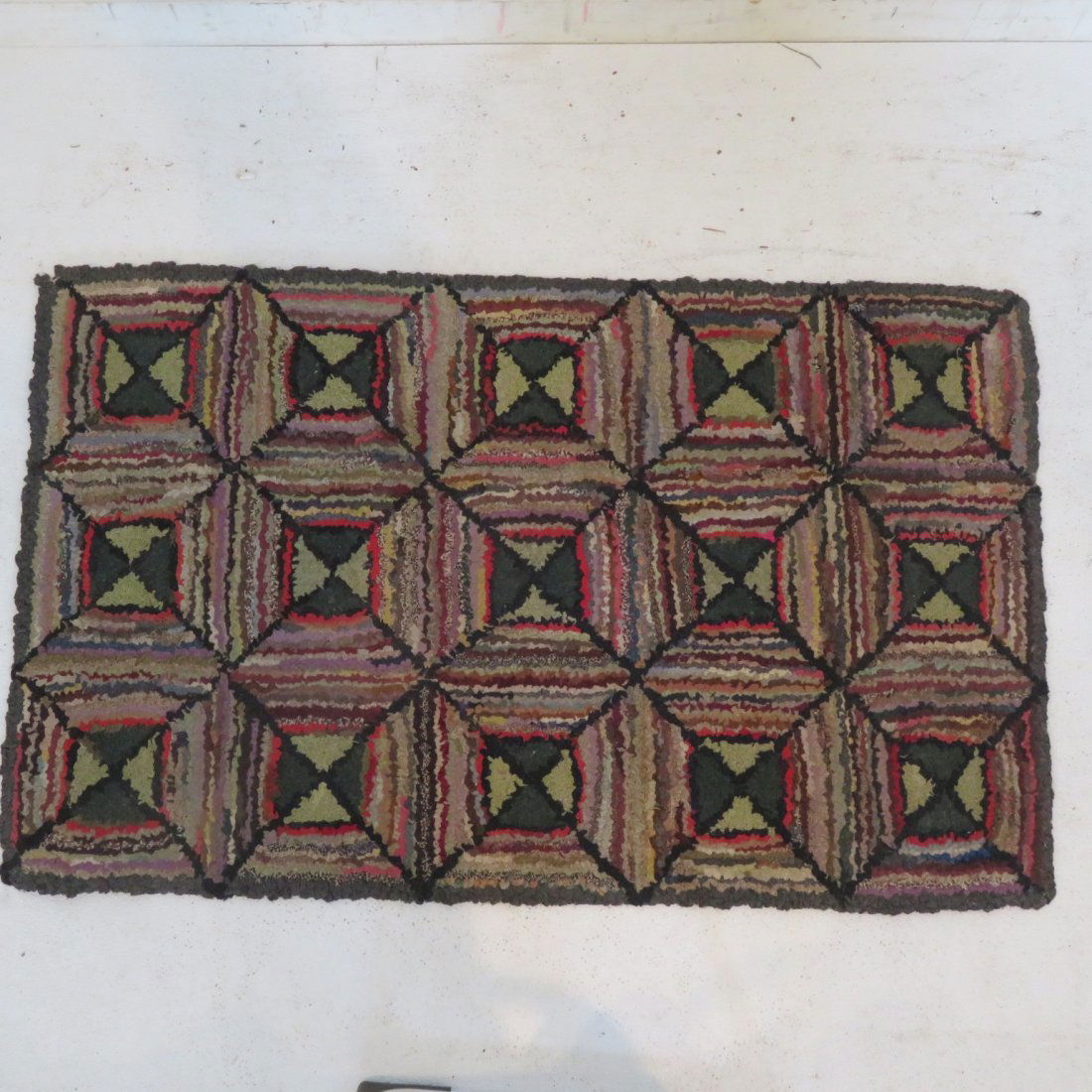 Log cabin variant hooked rug (1 of 2)