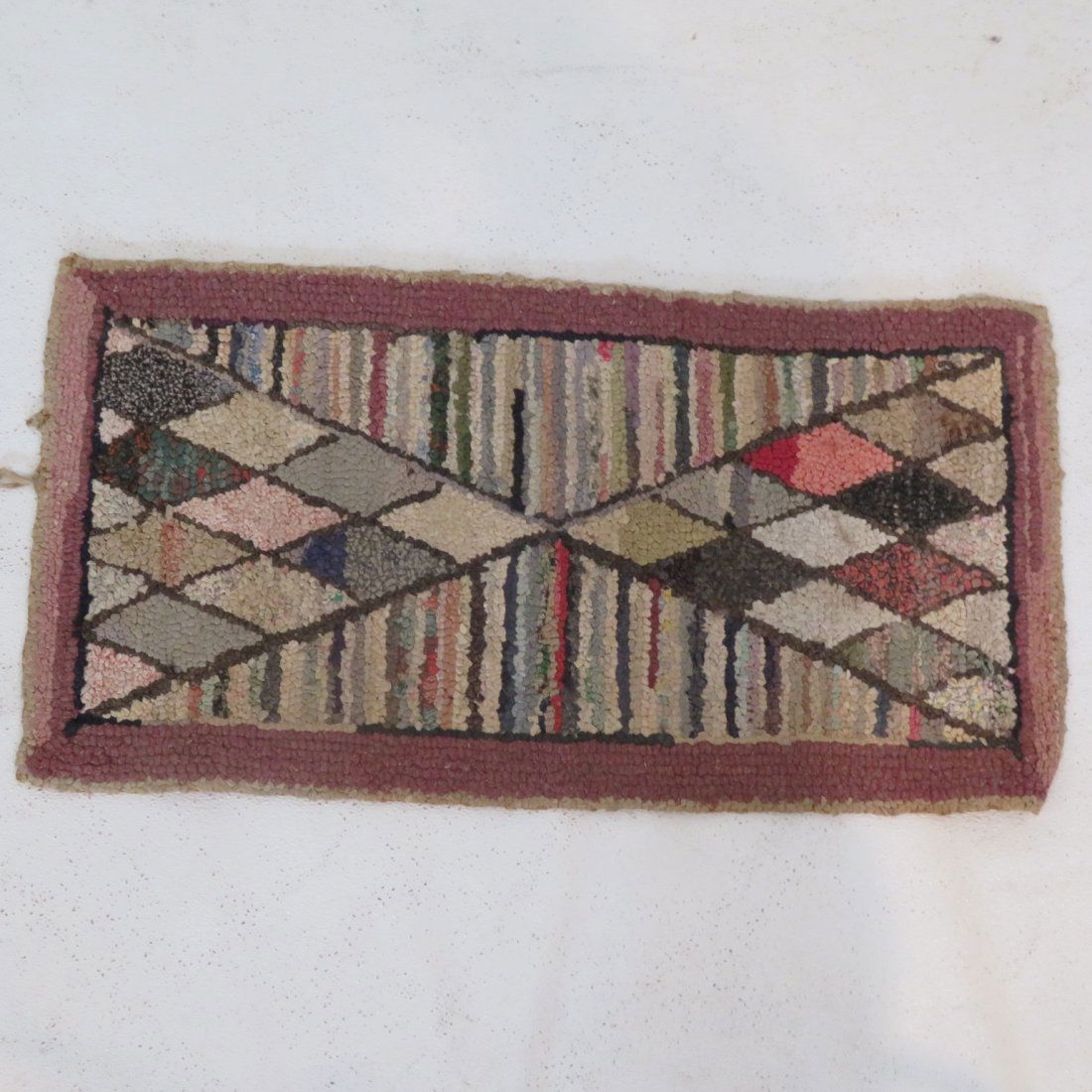 Hooked rug with geometric design (1 of 2)