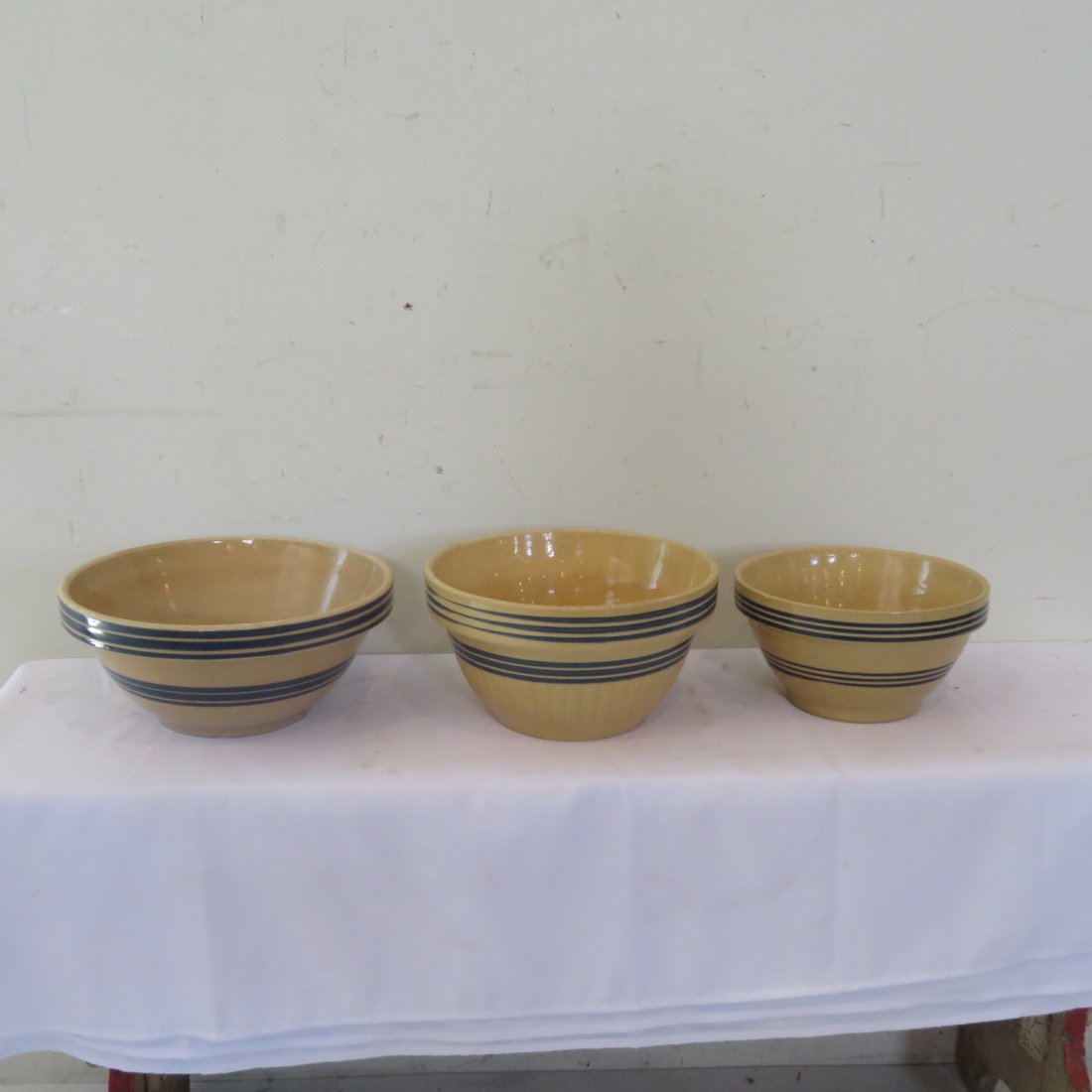 Assembled set of 3 yellowware bowls with blue stripes (1 of 5)