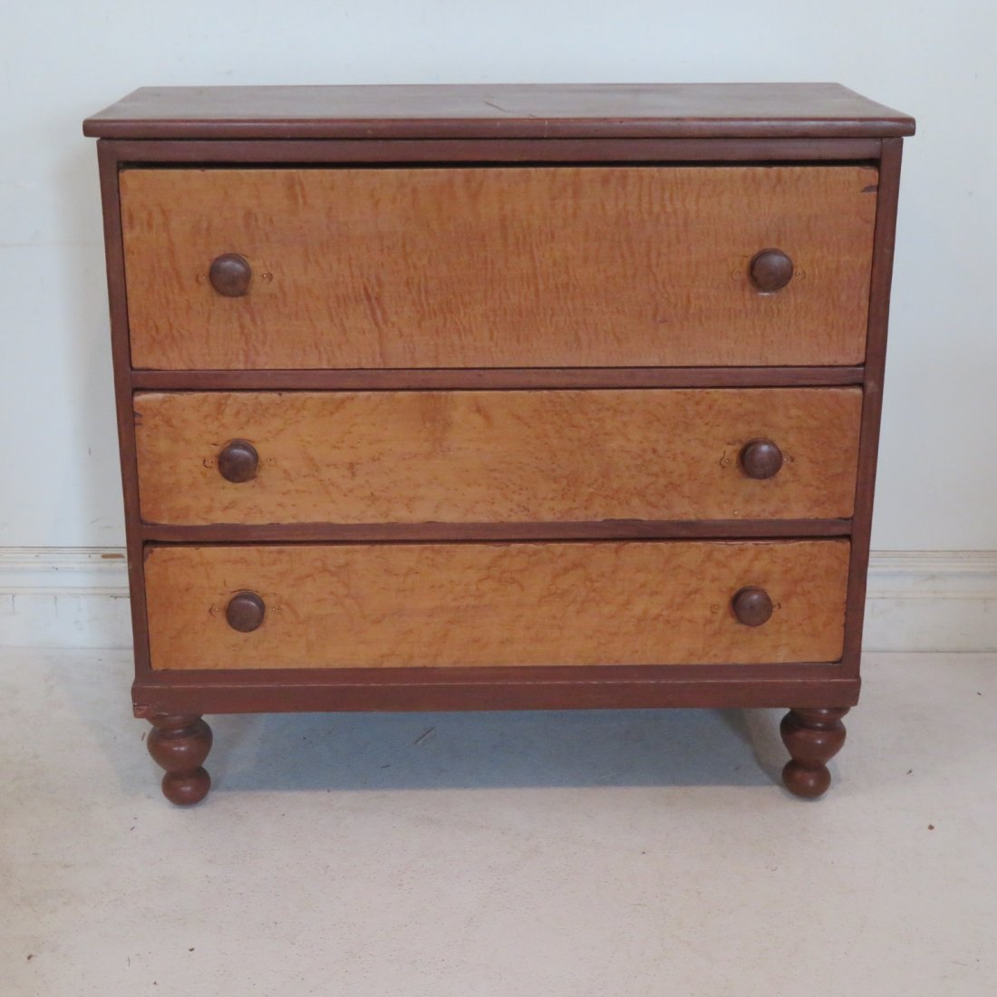 Poplar chest of drawers with tiger and birdseye maple: Poplar chest of drawers with tiger and birdseye maple on turned feet, 37"H x 38"W x 16.5"D