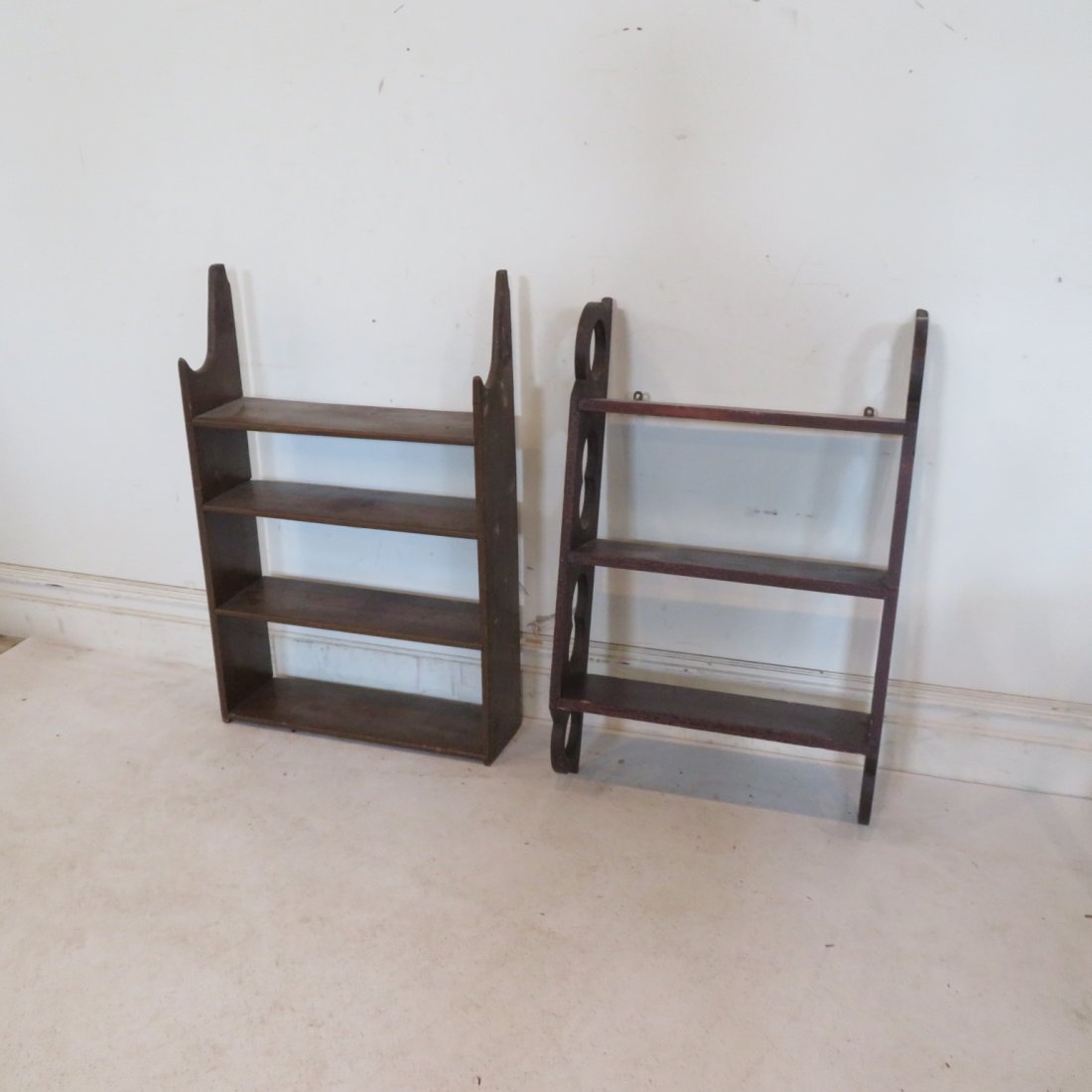 2 hanging bookshelves: 2 hanging sets of shelves, both have shelves rabbeted into sides, one in old mustard paint is 35"H x 22.5"W x 7"D, and other is old original surface