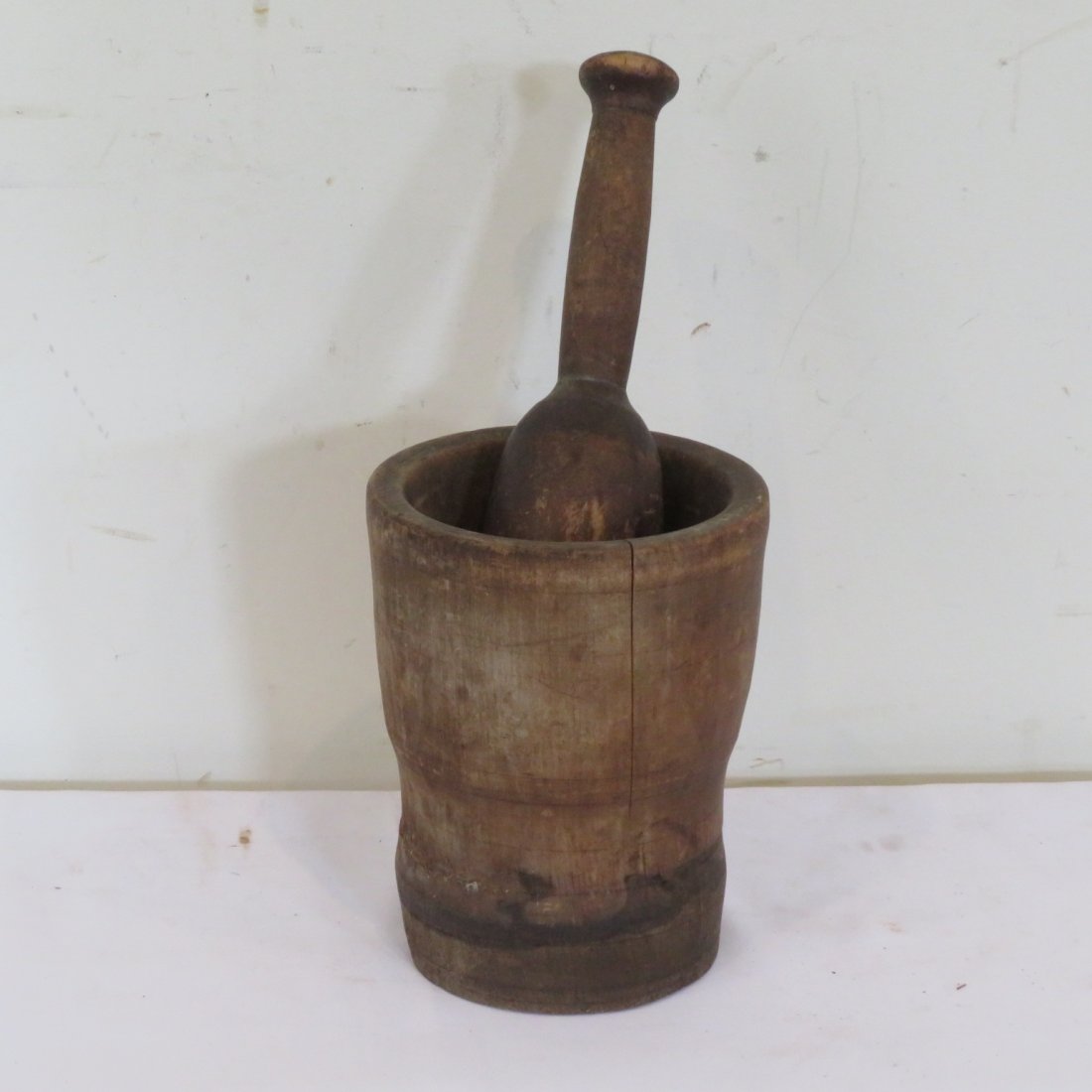 Wooden mortar and pestle: Wooden mortar and pestle, mortar is 7.5"H x 5.75"D, pestle is 11" long, old natural patina