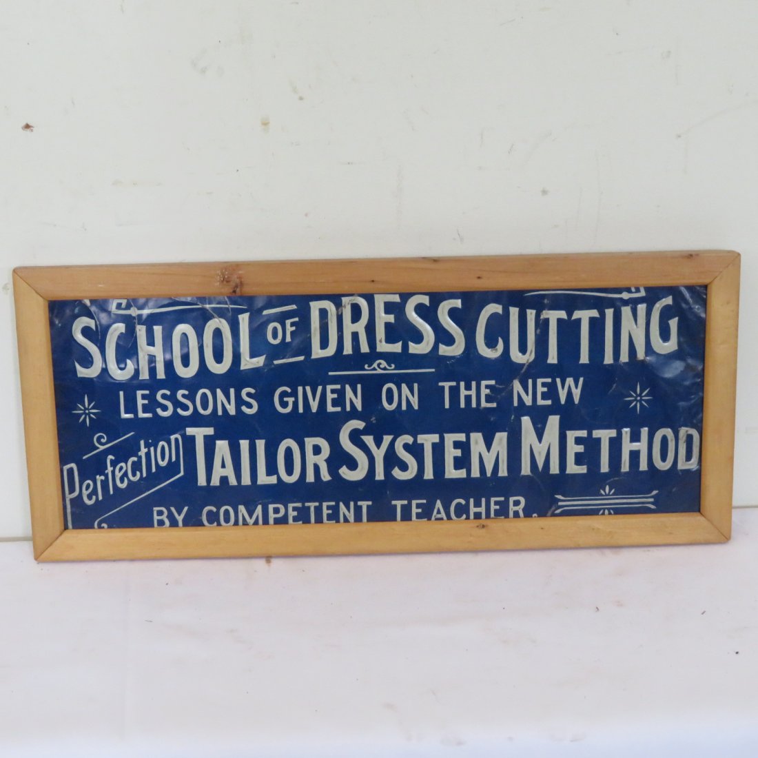 Tin sign "School of Dress Cutting" (1 of 3)