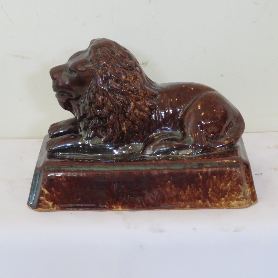 Rockingham glaze Ohio reclining lion (1 of 5)