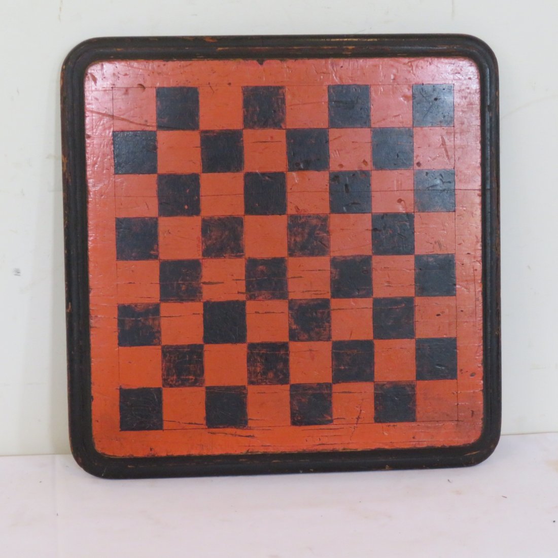 Pine game board in orange and black: Pine game board in orange and black, made from one thick board and edges have been beveled, 15.5" x 15.5" x 1.25"D