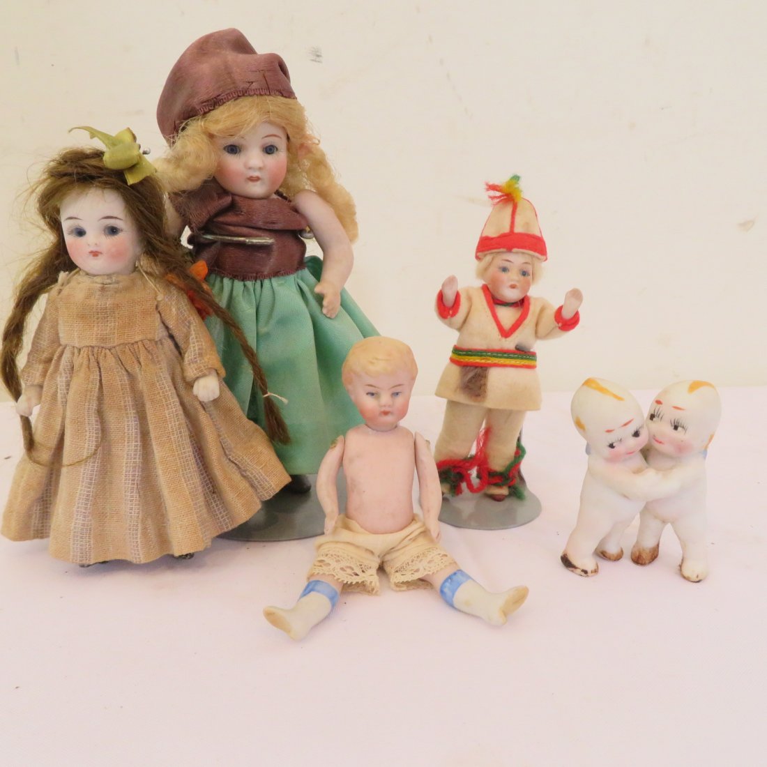 4 German bisque jointed dolls and one kewpie pair (1 of 7)