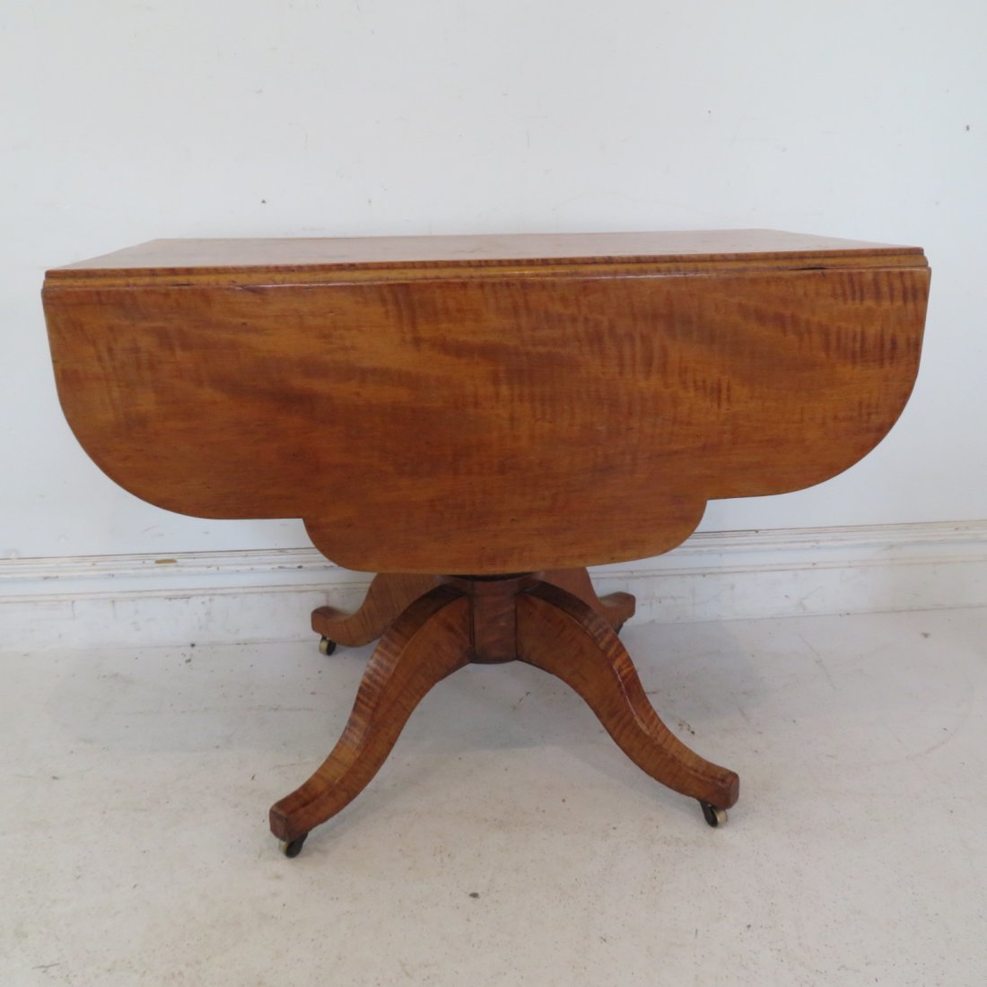 Circa 1850 tiger maple pedestal drop leaf table (1 of 6)