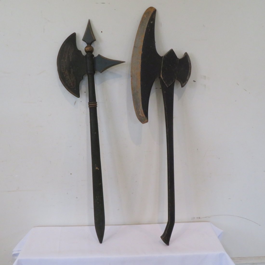 2 Folk Art wooden lodge axes: 2 Folk Art wooden lodge axes, one is dated Sept. 17, 1850 in old green paint 46"L x 14"H, the other one is in old black paint 49"L x 12.5"H