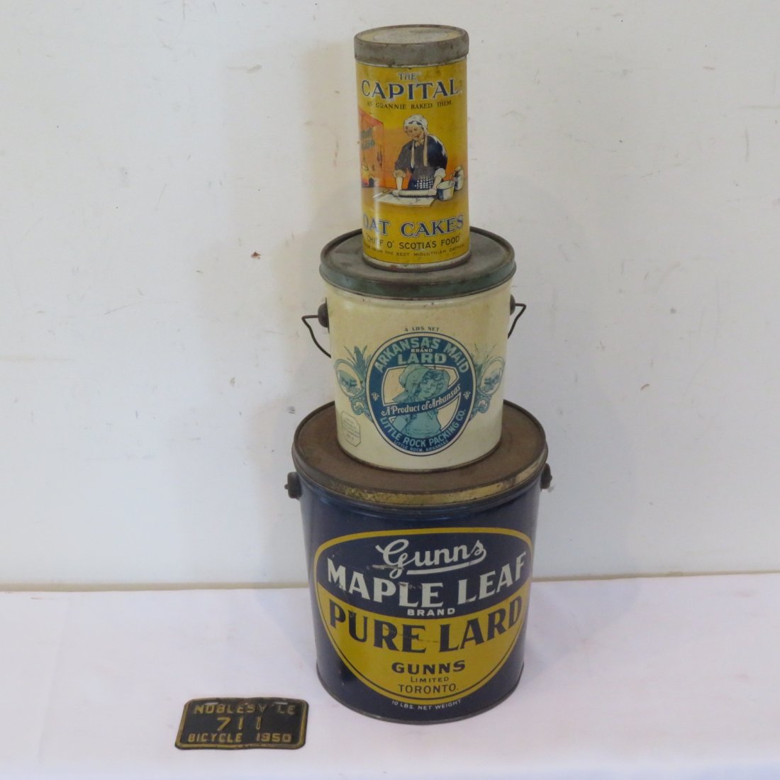 3 advertising tins and a 1950 Noblesville bicycle plate (1 of 5)