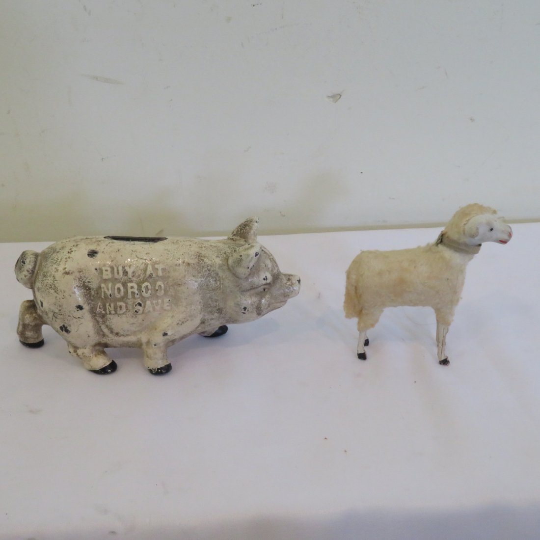 Cast iron pig bank and one wooly sheep (1 of 4)