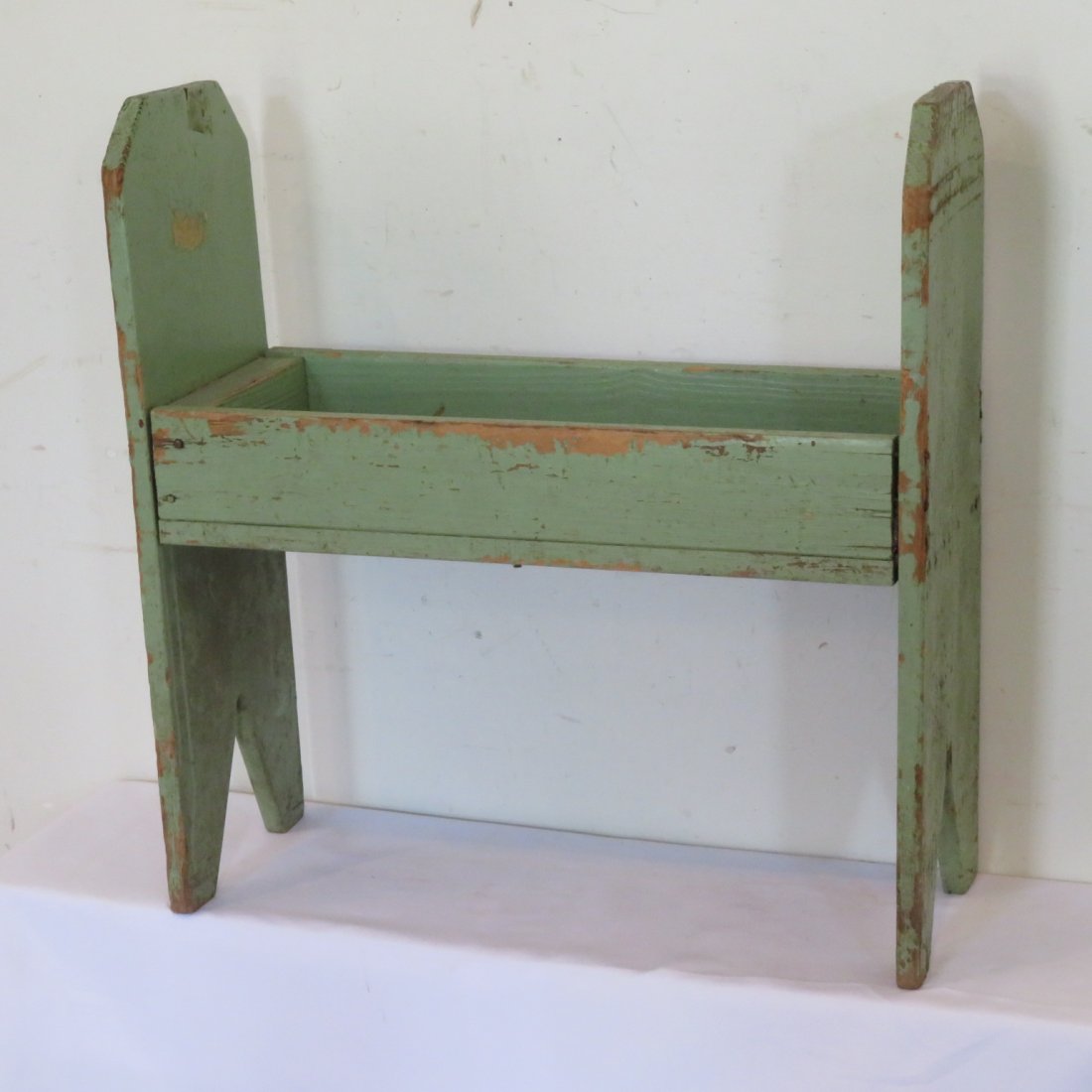 Green painted flower box: Green painted flower box with bootjack ends, round head nail construction, 27" t. x 26" wide x 10" d.