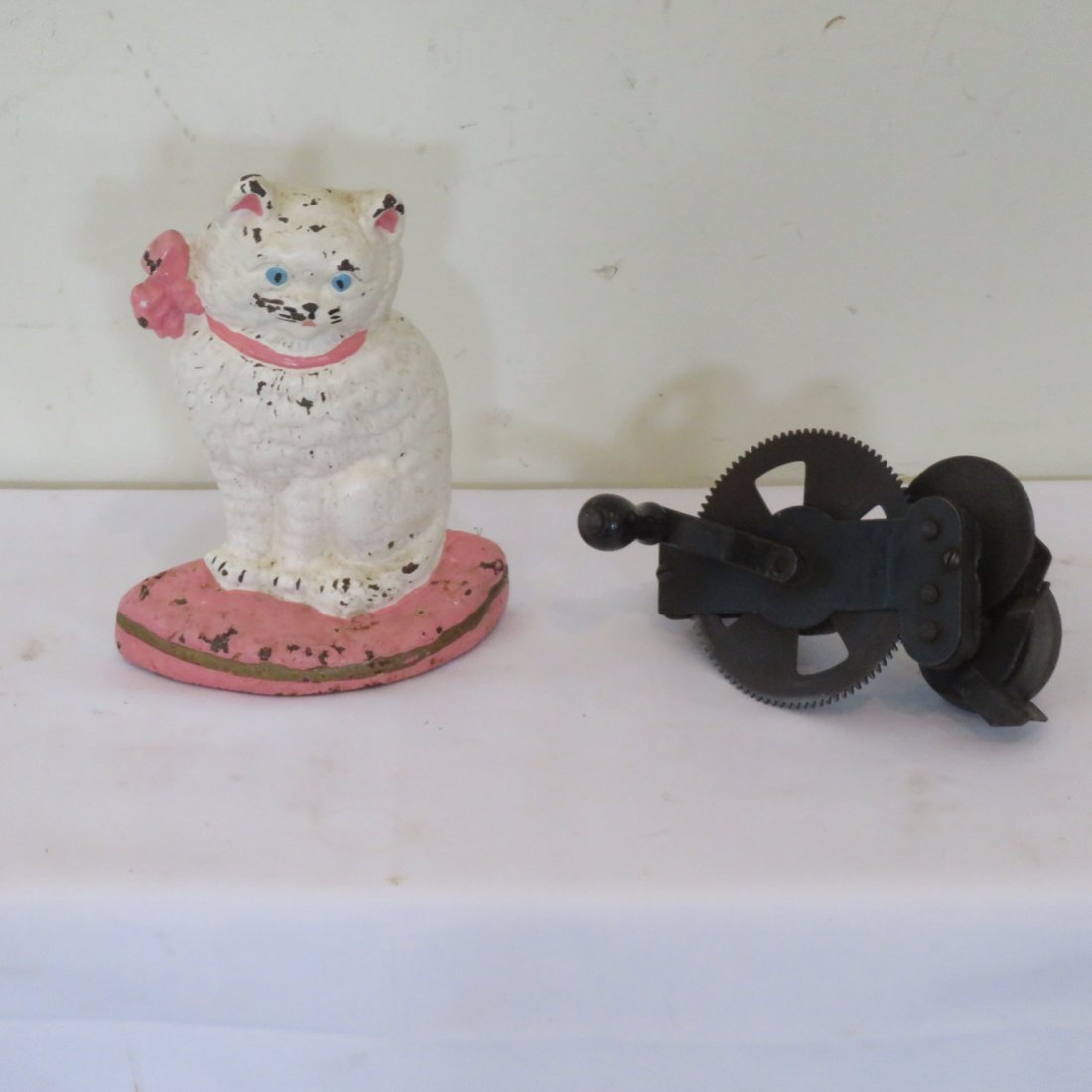 Cat w/ ribbon CI door stop and sharpener (1 of 5)