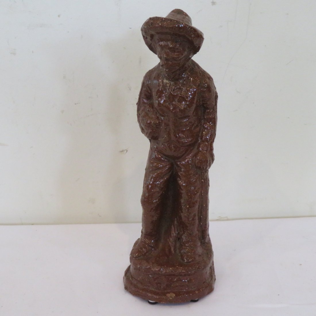 Sewer tile figure of farmer (1 of 6)
