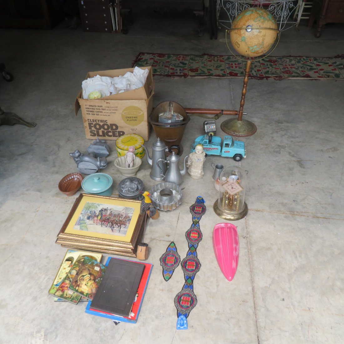 Large group of misc. items: Large group of misc. items includes period beaded belt with bakelite buckle, 2 composition dolls, food molds, 1950"s buddy L toy wrecker, 5 framed prints, box of china hand painted luncheon sets, glob