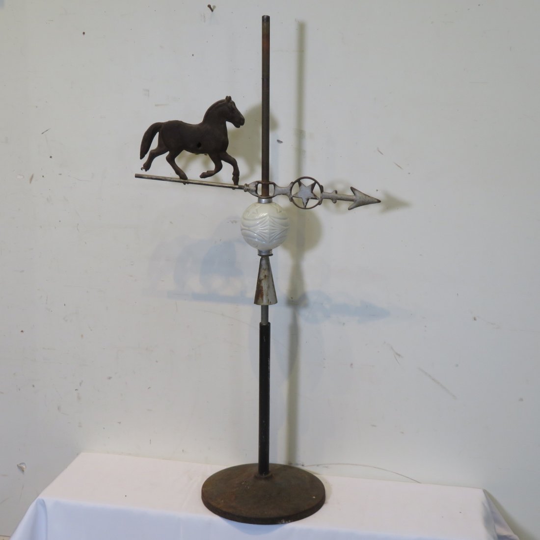 Weather vane with horse, star, and lightning rod globe (1 of 5)