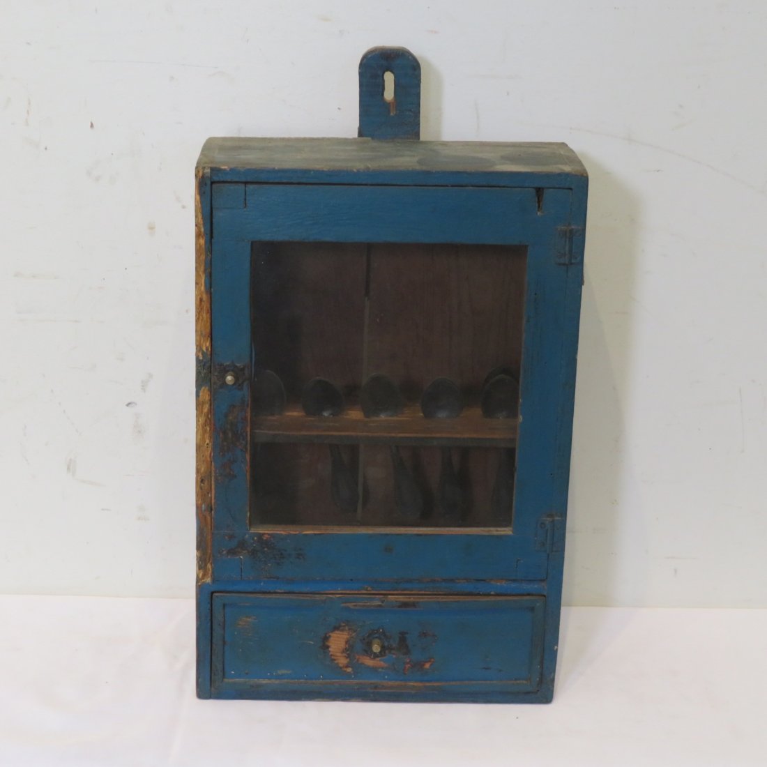 Hanging pine cabinet in old blue paint with glass door (1 of 6)