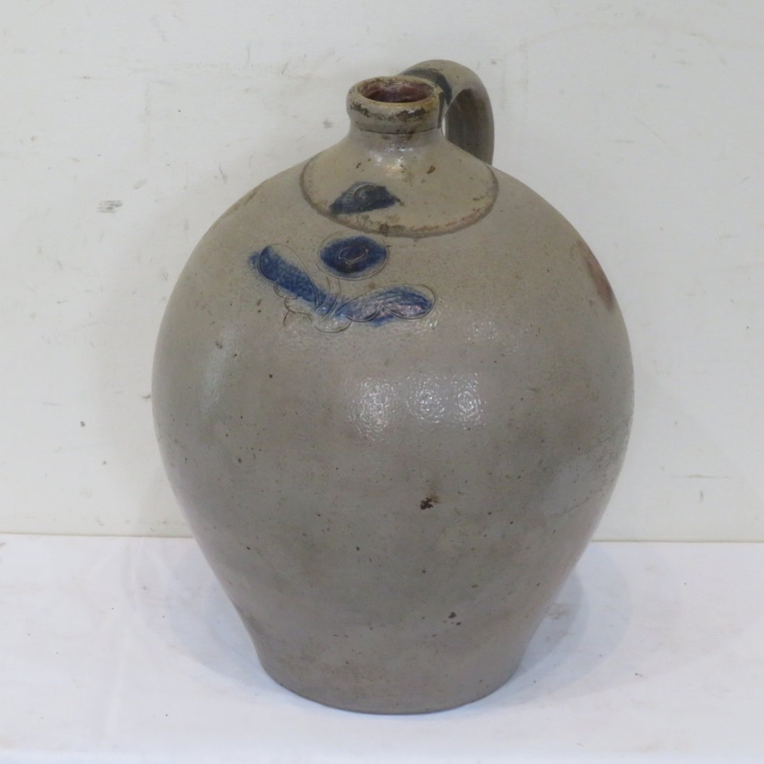 2 gal ovoid stoneware jug with incised blue flower (1 of 6)