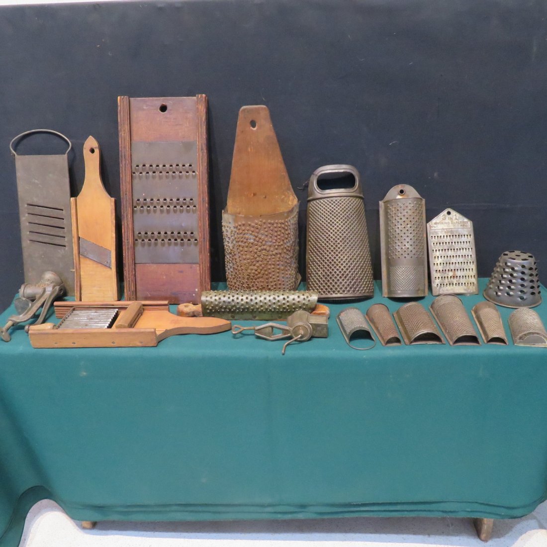 Group of tin graters: Group of tin graters, 2 home made with wood backs, Largest 14 1/2" t., few nutmeg graters