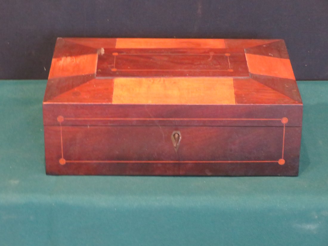 Mahogany and maple sewing box attributed to Shakers: Mahogany and maple sewing box attributed to Shakers, inlaid design on front and lid, inlaid escutcheon with lock and key, interior has a fitted tray with pincushions and little compartments, mirror in
