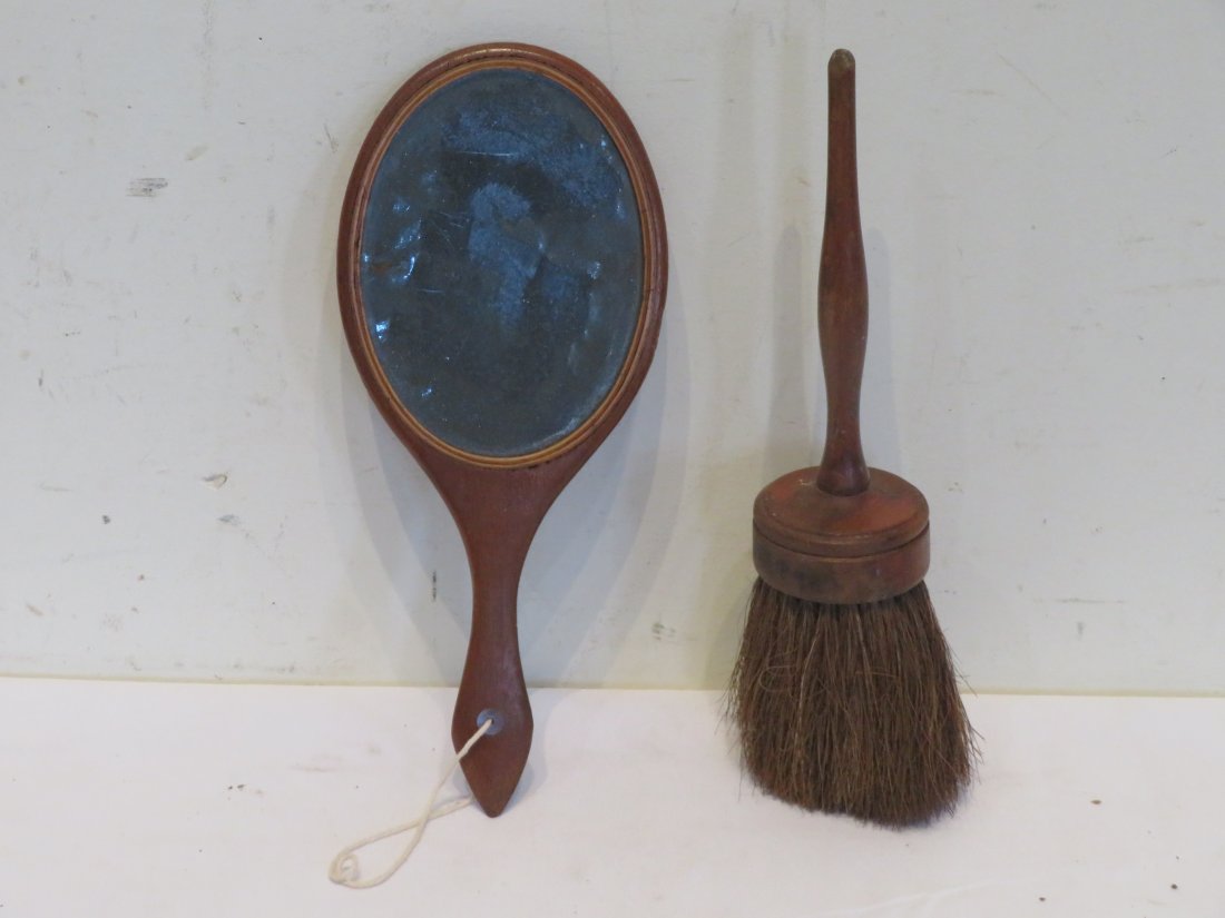 Shaker walnut hand mirror and horsehair brush: Walnut hand mirror with original mirror 11.5"L x 5"W and wood brush with horsehair bristles 11.5"L attributed to the Shakers. Ex. Late Morris Ferguson Collection