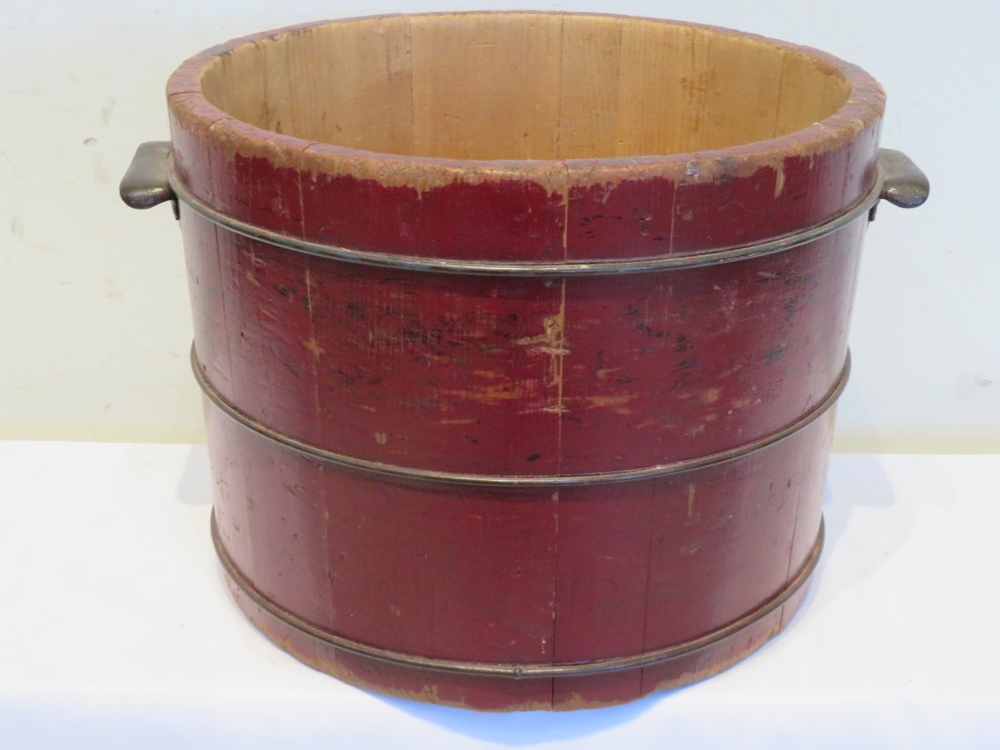 Wood pail in old red paint: Wood pail in old red paint with metal handles and wire hoops, 10 1/2" x 15 1/2" x 14"