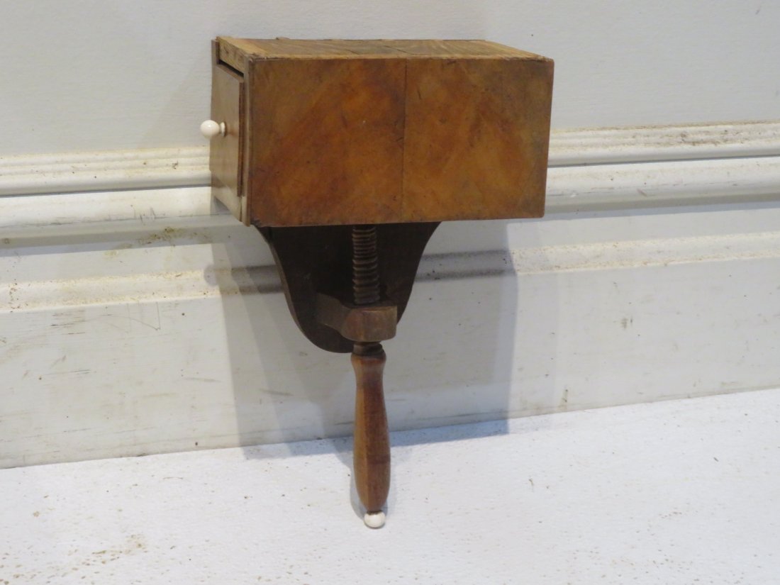 Wood sewing box with table clamp: Pine & satinwood sewing box with dovetailed drawer, dovetailed case and wood table clamp, bone drawer knob and button at end of clamp handle, dated in pencil 1849 on underneath side, 10" x 6 1/2" x 4"