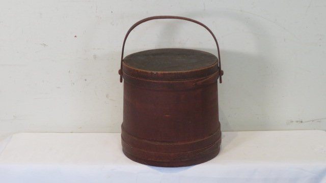 Wood firkin with handle in original red paint: Wood firkin with wood bands and handle in original red paint, 11 1/2" x 11 1/2" dia. top and 12"dia. at bottom