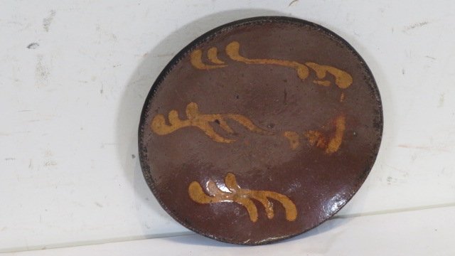 7 3/4" early redware plate with slip decoration (1 of 3)