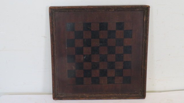 Early game board in old dark natural wood with black checker blocks (1 of 4)