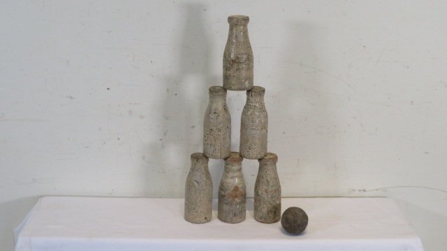 Old carnival wooden milk bottle game with old baseball in old paint (1 of 3)