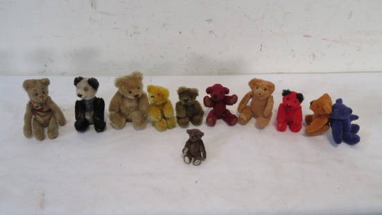 Group of 11 miniature bears: Group of 11 miniature bears including a 4" early jointed bear with shoe button eyes, a mohair panda, a variety of others with smallest bear 1.75"T signed "Little Gem Teddy Bear" and has leather paws,