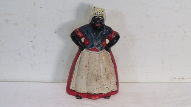 Cast iron Mammy doorstop: Cast iron Mammy doorstop, unmarked, 13"T x 8.5"W
