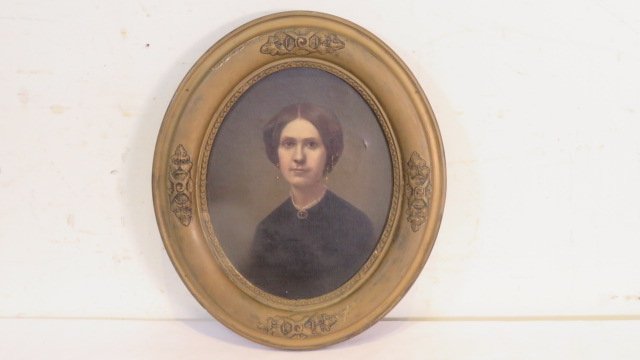 19th century O/C portrait of a young woman in original frame: 19th century O/C portrait of a young woman in original oval frame, overall 14"T x 12"W