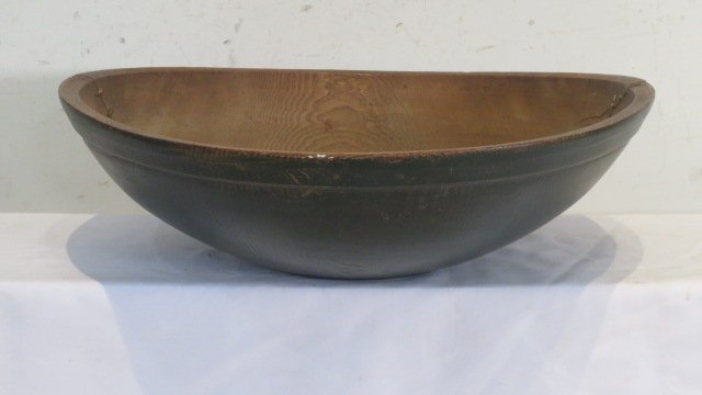 Ash out-of-round 21 1/2" wooden bowl: Ash out-of-round 21 1/2" wooden bowl, 6" deep, green painted surface, stapled make-do repair on a crack