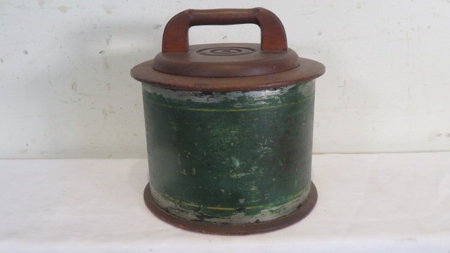 Tin and wood sugar box in old green paint: Tin and wood sugar box in old green paint with a faint Sugar stencil on side, wood bottom and wood top, lid twists off, tin sides, 9.5"T x 9.5"D