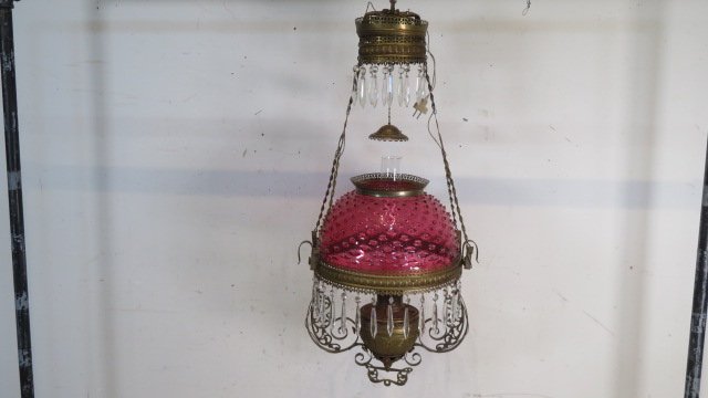 Late 19th century brass kerosene hanging lamp with cranberry hobnail shade (1 of 4)