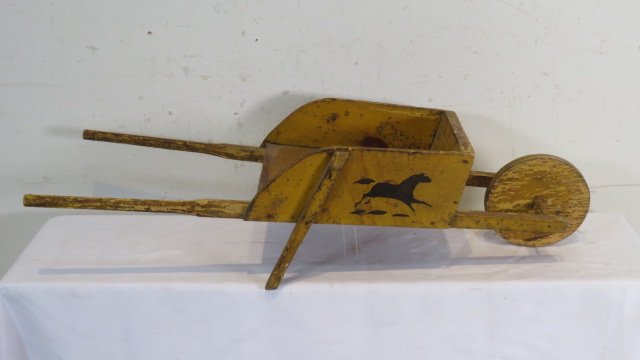 Child's wheelbarrow with stenciled running horse in old mustard paint (1 of 4)
