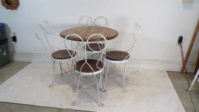 Iron ice cream table and 4 chairs with unusual double loop backs (1 of 4)