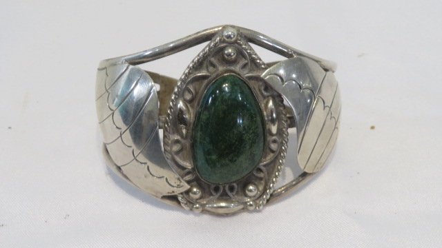 Unmarked southwestern lady's cuff bracelet, stamped sterling (1 of 4)