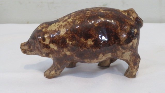 Yellow ware pig flask with Rockingham glaze (1 of 5)