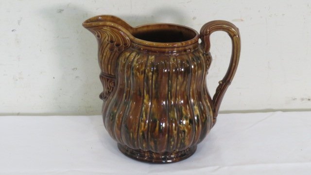 Yellow ware pitcher with flint enamel glaze signed Bennington (1 of 5)