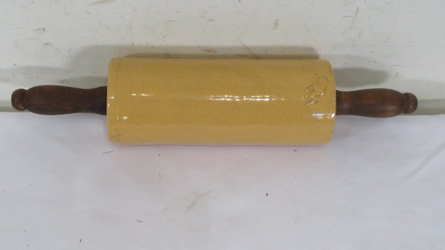 Yellow ware rolling pin with wood handles (1 of 2)