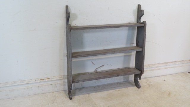 Pine hanging shelf with cut-out sides in gray painted surface (1 of 3)