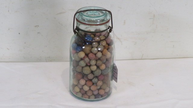 Jar of 308 old marbles (1 of 2)