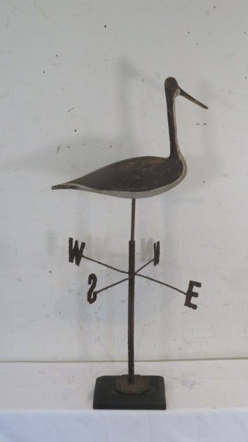 Large wood shore bird with tack eyes on 19th century cast iron directional (1 of 9)